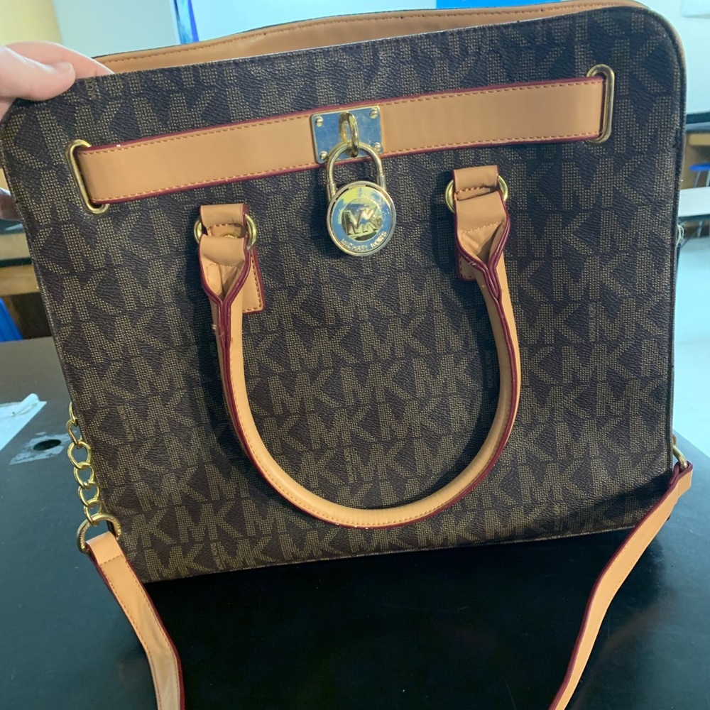 Moderately used “Michael Kors,” tote purse